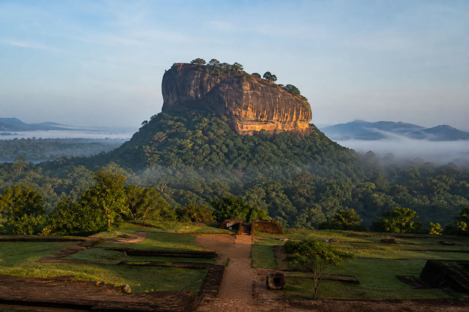 Sigiriya Rock Fortress above the surrounding forest
